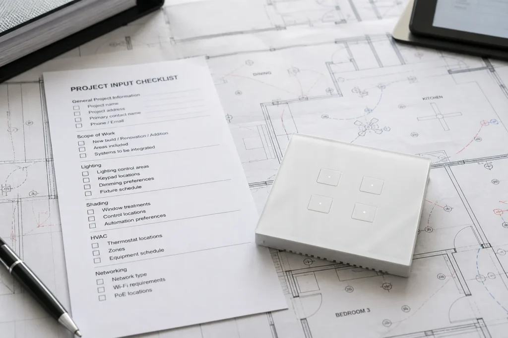 Integrator reviewing a marked floor plan and project input checklist for smart home automation installation